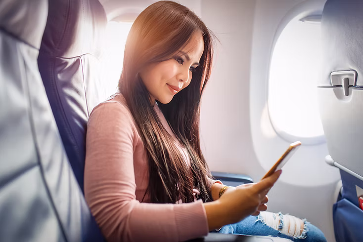 Passenger Using Phone